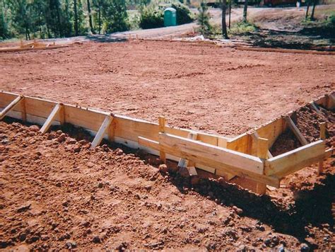 building pad with skid steer|how to build a house pad.